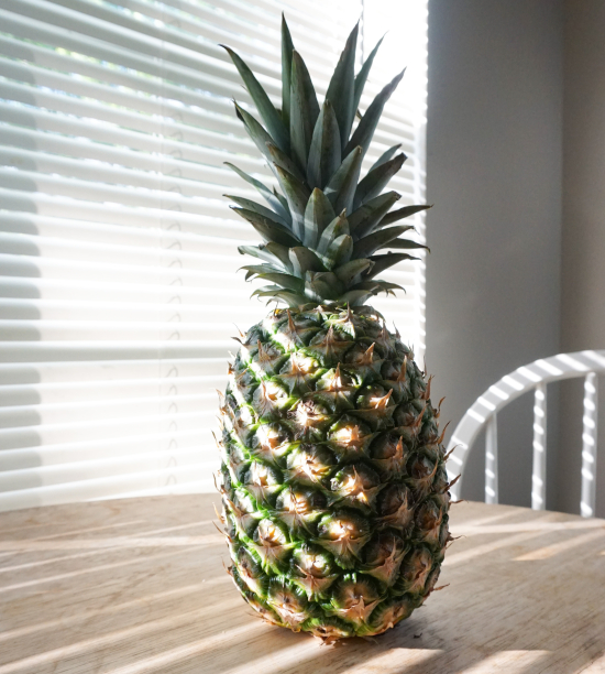 ripen a pineapple on a counter in warm